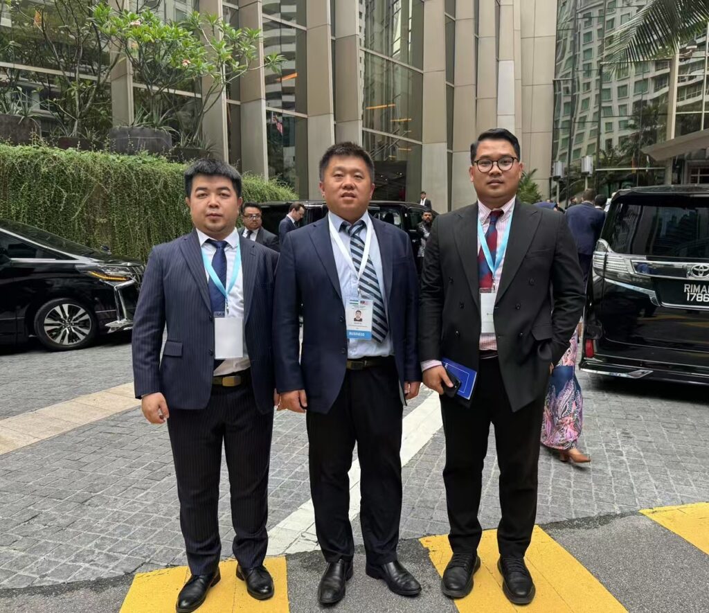 Figure 1: Our Managing Director, Zhang Lei (center), attended the Uzbekistan-Malaysia Summit in Uzbekistan