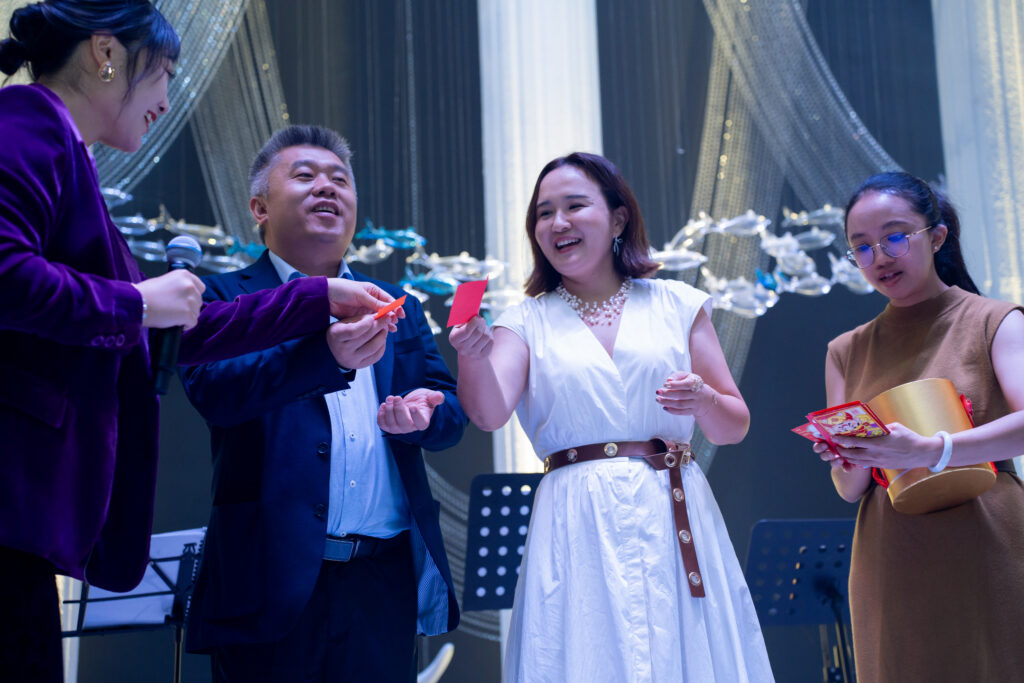 Figure 12: Managing Director Zhang Lei and his wife announcing the list of award winners